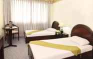 Kamar Tidur 7 Holiday Plaza Hotel