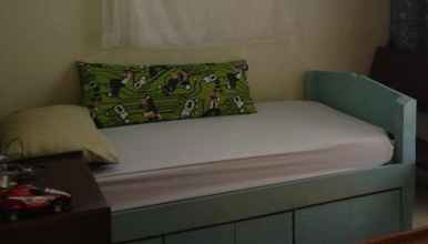 Kamar Tidur Buragwis Guesthouse