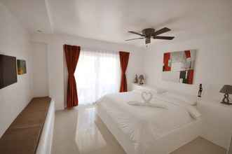 Kamar Tidur 4 Calypso Beach and Dive Resort