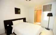 ห้องนอน 4 Merdeka Suites Hotel