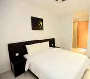 ห้องนอน 4 Merdeka Suites Hotel