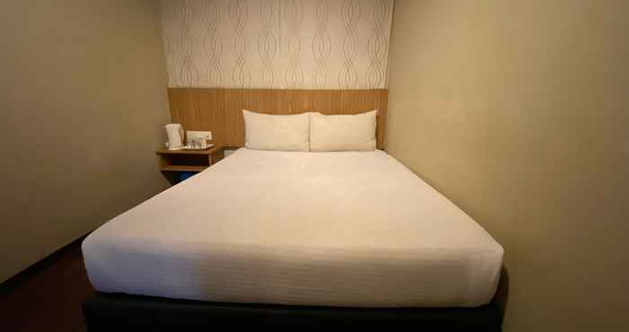 Bilik Tidur OYO 89752 7 Days Express Hotel