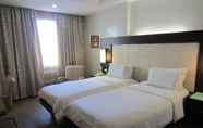 Kamar Tidur 2 Circle Inn Hotel and Suites