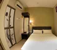 ห้องนอน 4 Ayer Hitam Hotel