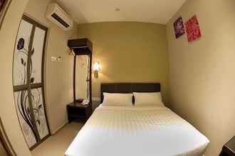 Phòng ngủ 4 Ayer Hitam Hotel