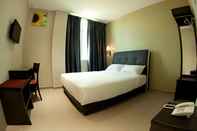 ห้องนอน Ayer Hitam Hotel