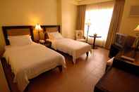 Bilik Tidur Planta Centro Bacolod Hotel and Residences