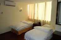 Bedroom Aditya Hotel