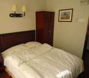 Bedroom 3 Aditya Hotel