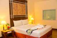 Kamar Tidur Friendlytel Hotel