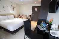 Kamar Tidur MD Grand Hotel