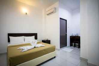 Kamar Tidur 4 G Times Inn Hotel