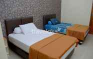 ห้องนอน 4 Single Room near Kebun Binatang Ragunan (RAG)