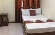 Kamar Tidur 4 Aquari Travellers Inn