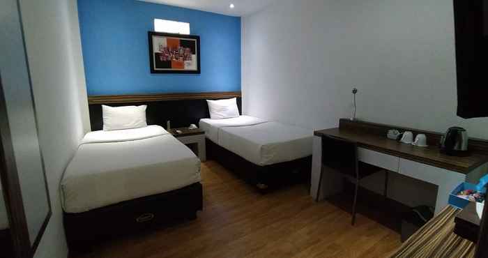 ห้องนอน Gania Hotel Bandung