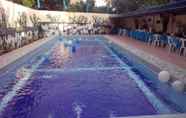 Swimming Pool 5 Dineros Hometel