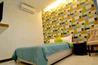 Kamar Tidur Travelers Inn Dago