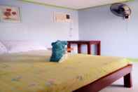 Kamar Tidur Blue Sea Inn