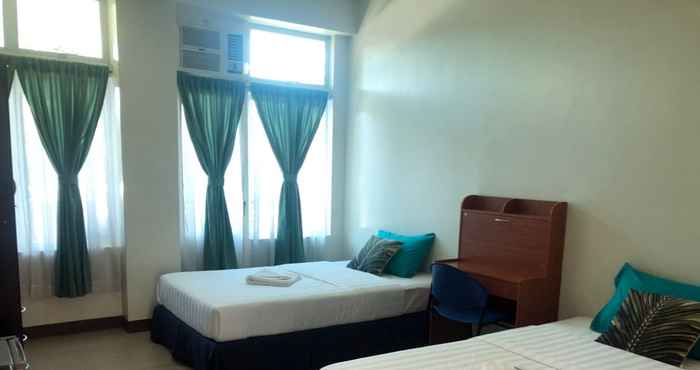 Kamar Tidur Dumaguete Dormitel 