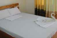 Kamar Tidur AJ Travellers Inn