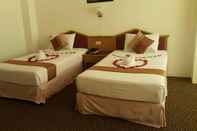 Bilik Tidur Merlin Grand Hotel