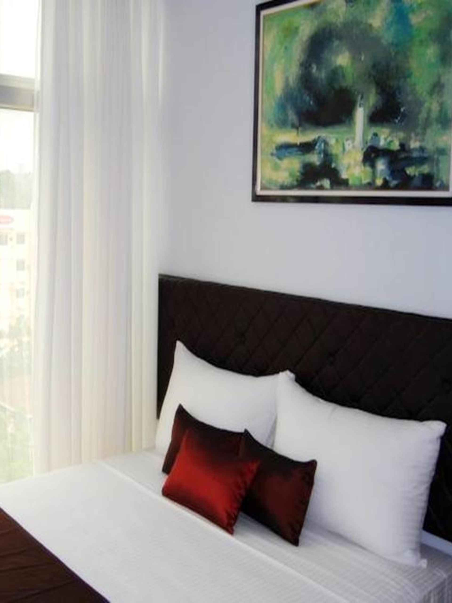 Kamar Tidur Capitol Central Hotel and Suites