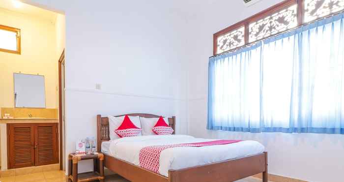 Bedroom OYO 1741 Komala Indah Cottages