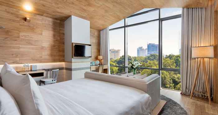 Phòng ngủ Fusion Suites Saigon