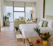 Phòng ngủ 4 Fusion Suites Da Nang – Daily Reflexology Inclusive