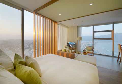 Phòng ngủ Fusion Suites Da Nang – Daily Reflexology Inclusive
