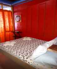 Kamar Tidur 4 Islandfront Cottages and Restaurant