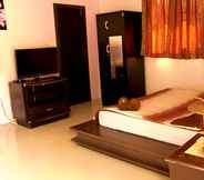 Phòng ngủ 3 Bann Chompu Resort