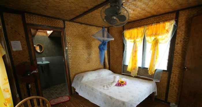 Bedroom Lugadia Beach Cottages