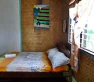 Kamar Tidur 6 Basio's Place Tourist Inn by RedDoorz