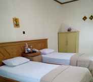 Kamar Tidur 5 Hotel New Merdeka Jember