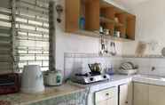 ห้องนอน 5 Rosita's Cottages with Kitchen II