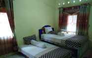 Kamar Tidur 7 Homestay Rusmiyati KII