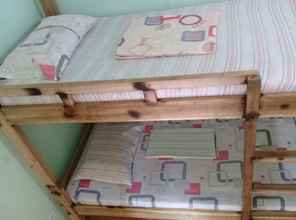 Kamar Tidur 4 At The Moment Hostel