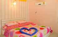 Kamar Tidur 5 Sweet Lighthouse Home Stay