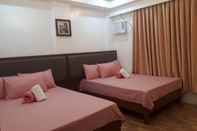 Kamar Tidur Jurias Garden Hotel