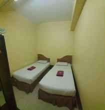 Kamar Tidur 4 OYO 90162 Aj Hotel