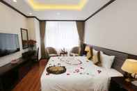 ห้องนอน Lenid Hotel Tho Nhuom