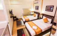 Kamar Tidur 5 Prime City Resort Hotel powered by G Tower