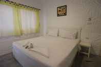 Kamar Tidur The White 