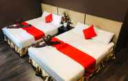 Kamar Tidur 6 Highway Times Inn Hotel