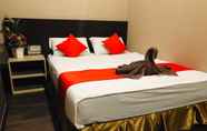 Kamar Tidur 2 Highway Times Inn Hotel