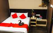 Kamar Tidur 4 Highway Times Inn Hotel