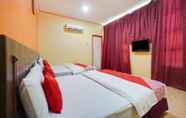 Kamar Tidur 2 Bercam Times Inn Hotel