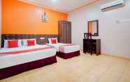 Kamar Tidur 6 Bercam Times Inn Hotel