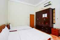 Bedroom Caraven Hotel